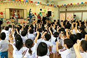 A Visit to the kindergartens, the nursery schools, the elementary schools, the city hall and the prefectural government office in Kumamoto.