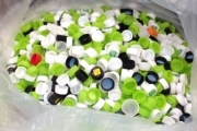 Collecting PET bottle caps and used stamps